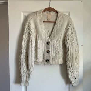 Cropped cable knit sweater